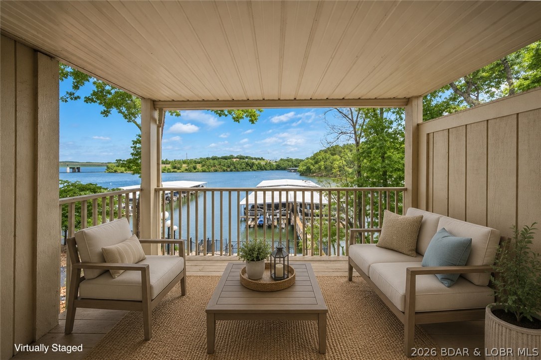 Affordable lake living is hard to find, especially with a boat slip, but this condo offers an incredible opportunity to own at the Lake of the Ozarks for under $200,000. Located at the 1MM of the Grand Glaize, you'll be just minutes from Dog Days, Backwater Jack's, the Lake of the Ozarks State Park, and all the excitement of the Shootout. This partially renovated condo already has many of the major updates completed, including all new wiring, new drywall, new flooring, a new hot water heater, new refrigerator, new microwave, and two fully remodeled bathrooms. The hard work and expensive projects have already been done, leaving the perfect opportunity for a new owner to add their personal style and finishing touches. Whether you're looking for a weekend getaway, full-time residence, or investment property, this condo offers outstanding value and lake access with an included 10x30 boat slip. Skip the major renovation headaches and start enjoying lake life while making the space your own.