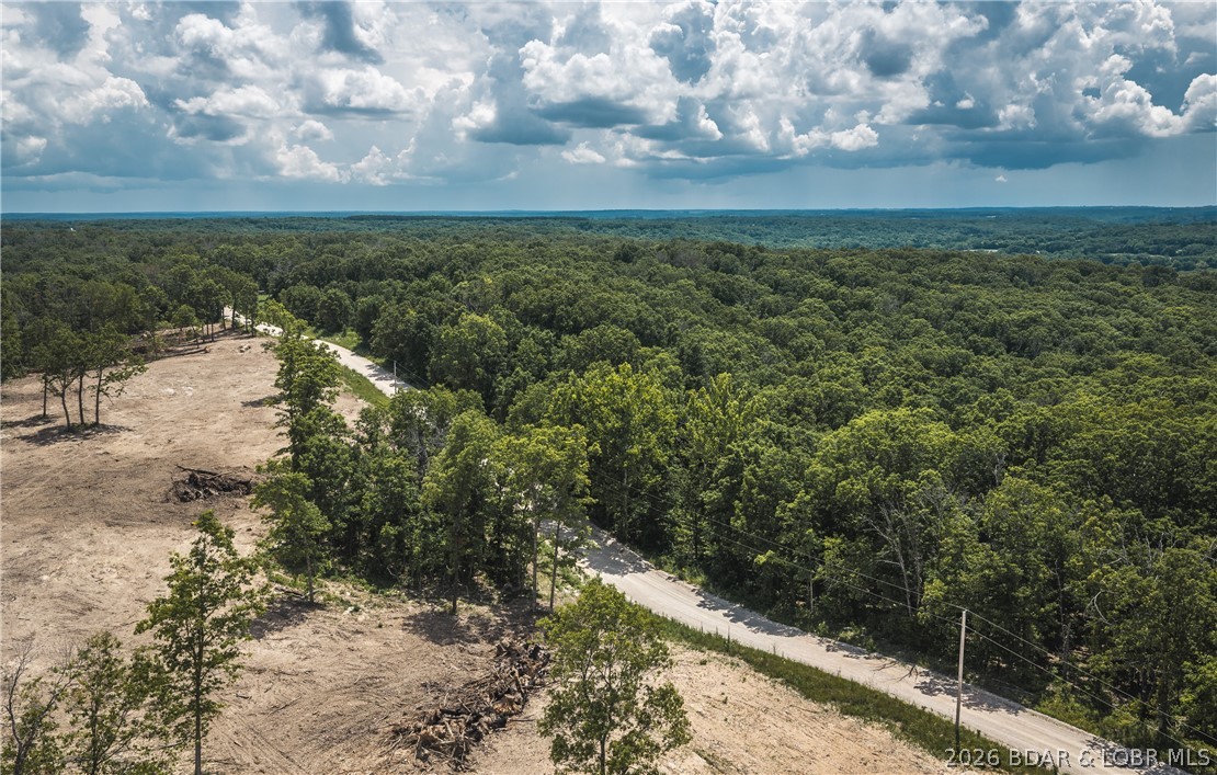 Six 40 m/l acre tracts located in Camden County. These tracts have mature, old growth ,marketable timber. Great deer and turkey hunting with several potential building spots, electric at the main road (not access road), and a wet weather creek running through. Close proximity to the little Niangua creek and Lake Of the Ozarks.