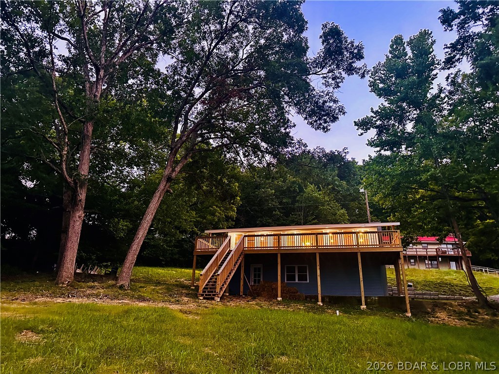 Adorable Lakefront Retreat/Newly Remodeled in 2026 at the 66MM. Turn key lake living awaits! This completely gutted and remodeled lakefront home combines modern style with effortless waterfront access. Situated at the desirable 66 MM this property offers the perfect blend of high-end finishes, open-concept design and a gentle slope to the water. Key Property Highlights: Move In Ready with 2 bedrooms, 1.5 bathrooms with a walkout basement. You will have Peace of mind with a Brand-new septic system engineered to last for years! A half bathroom sits right next to a large area waiting for your personal touch. Reframe it into a premium entertainment zone or a a private third bedroom. This rare gentle slope of the lot makes launching your water toys a breeze. It is absolutely perfect for kayaking, canoeing, or paddleboarding. Close to Bottoms Up Marina, Red Fox and the best fishing spots. Schedule through ShowTime.