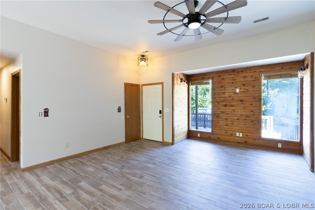 Welcome to this 3-bedroom, 2-bathroom home in Sunrise Beach, MO located in the beautiful Lake of the Ozark's. Experience effortless one-level living in, spanning 1,010 square feet. This property offers an attached double car garage with a brand new mini-split AC and heat. Step inside and enjoy the open, airy feel created by 9-foot ceilings throughout the interior. The spacious floor plan offers comfort and functionality, perfect for full-time living or a relaxing weekend retreat. Enjoy lake life perks with an included 10’ x 24’ boat slip at the community dock – ideal for quick and easy access to the water. The dock offers panoramic lake views. This home is ready to deliver the laid-back Lake of the Ozarks lifestyle. Don’t miss this opportunity to enjoy comfort, convenience, and lakefront access all in one package. Call us for private showing today!