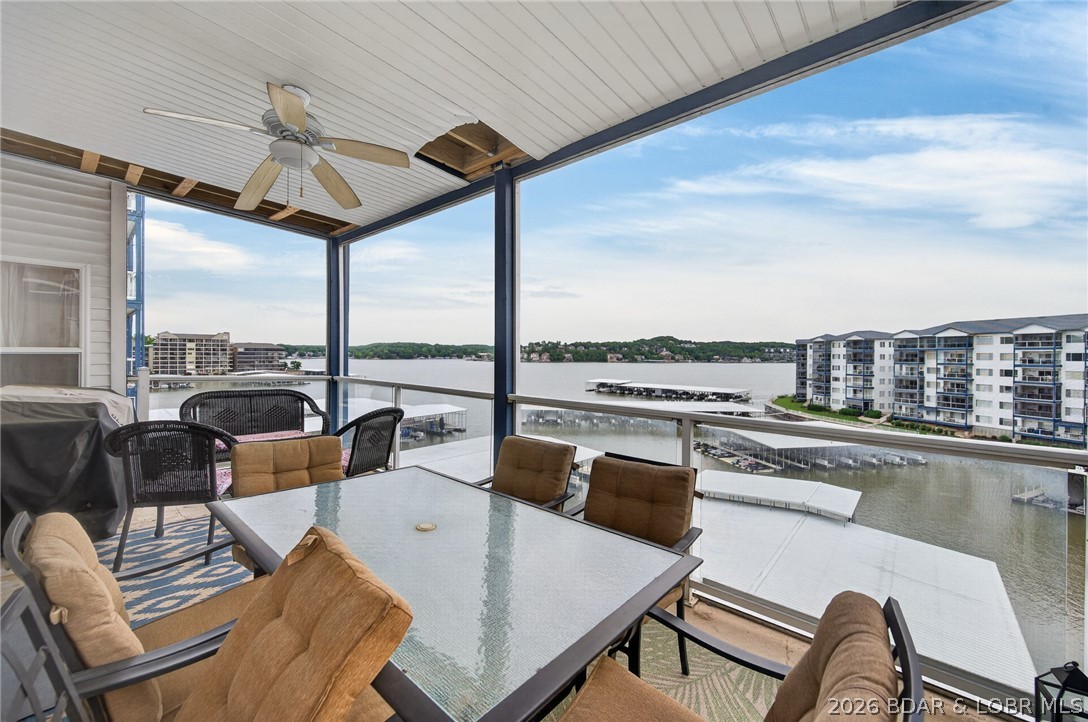 Lakefront condo in an highly desirable building 183 at the 2-mile marker of the Osage. This turn-key 3-bedroom, 2.5-bath condo offers an easy, low-maintenance lifestyle in the heart of Lake Ozark—just off HH (Horseshoe Bend), minutes from the 'Strip', restaurants, and shopping.  This main-channel lake view condo includes a 12x36 boat slip, two personal watercraft (PWC) slips, making it ideal for boaters and lake enthusiasts. Northeasterly views provide enjoyable sun exposure while overlooking the big water.  Inside, enjoy an open-concept floor plan, a cozy fireplace, and a covered screened deck perfect for relaxing and watching lake activity year-round. Offered fully furnished, this condo is truly move-in ready—just bring your suitcase and start enjoying lake life.  Residents enjoy three swimming pools, including the Building 183 pool with step-free access via Elevator 7—no stairs required. A lighted, concrete lakefront promenade wraps around the property, perfect for walking any time of day or evening.  Whether you’re searching for a Lake Ozark vacation condo, second home, or investment property, this location, boat setup, and turnkey convenience are hard to beat.