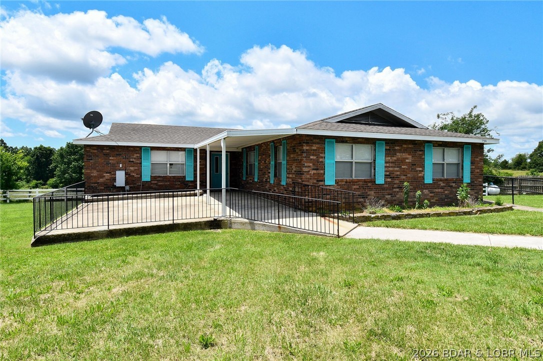 REDUCED PRICE !!!!!!!SPACIOUS RANCH HOME SITTING ON 3 PICTURESQUE ACRES WITH PLENTY OF SPACE FOR THE FAMILY. THIS LARGE MOSTLY ALL BRICK HOME HAS SOME UNIQUE FEATURES MAKING IT PERFECT FOR A LARGE FAMILY OR MULTI FAMILY LIVING. CURRENTLY SET UP WITH 7 BEDROOMS AND 2 FULL BATHS IT COULD ALSO BE EASILY CONVERTED INTO LESS ROOMS AND MORE LIVING SPACE. THERE IS A NICE SIZE KITCHEN WITH A BAR TOP, DINING SPACE, SMALL ROOM THAT WOULD SERVE PERFECTLY AS A PANTRY AND LARGE LIVING ROOM. BOTH BATHROOMS HAVE WALK IN SHOWERS, SINGLE VANITIES AND LINEN CLOSETS. THE OUTDOOR LIVING SPACE IS A LARGE FRONT PATIO THAT IS PARTIALLY COVERED. THIS HOME IS SITUATED FOR THE PERFECT EVENING SUNSETS AND 3 ACRES OF THE OZARKS TO ENJOY!