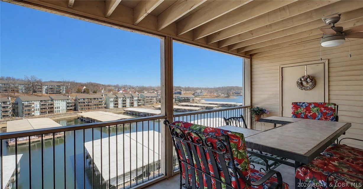 Lake days are easy from this 3-bedroom, 2-bath condo at Bristol Bay, complete with a 12 x 32 boat slip w/hoist and peaceful lake views. The open living and dining area features a cozy fireplace and large windows that bring in natural light while overlooking the water. The kitchen offers a breakfast bar, pantry, and nearby laundry room for everyday convenience. Just off the living room, the screened-in deck provides a comfortable place to relax and enjoy the lake setting, along with extra storage for lake gear. You can see your dock slip from your deck! The Primary Suite is nicely sized and offers a walk-in closet and private bath. Bristol Bay showcases amenities residents love, including a community clubhouse, pool, and well-kept green space, creating a relaxed lakeside environment. Whether you're looking for a full-time home, weekend retreat, or investment property, this condo offers an easy way to enjoy lake living.