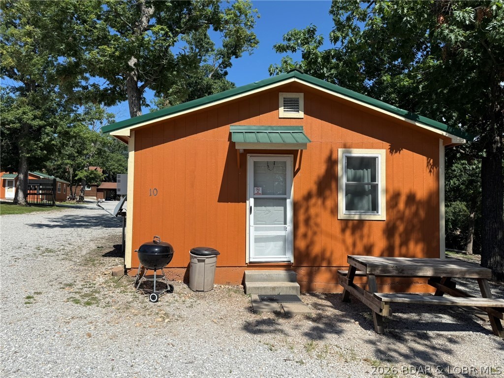 Cabin 10 is a single room with full kitchen, range with oven and refrigerator. Just down the road from Truman State Park Marina giving you quick and easy access to Truman Lake, while also being close to Drake Harbor where you can access the Lake of the Ozarks. This cabin has been a successful rental and has a long client list. Could be utilized as an Airbnb or long-term rental on the side.