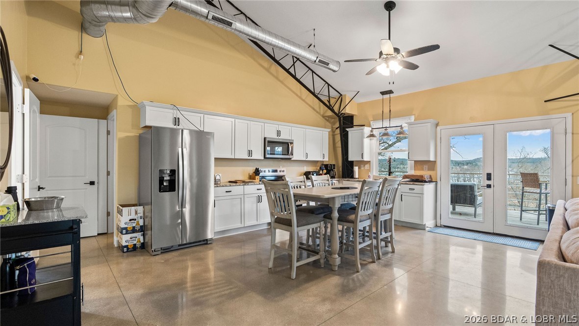 Enjoy the best of lakefront living in this beautiful 2023-built 4-bedroom, 2-bath home located in a quiet, protected cove with main channel views. No-wake buoys help keep the water calm, making this an ideal spot for swimming right off the dock while still enjoying the big-water scenery. The home features thoughtful finishes throughout and comes fully furnished and truly turn-key, making it ready for immediate enjoyment. Step outside to a spacious deck perfect for relaxing or entertaining while overlooking the lake. The property includes a fully permitted dock with internet wired directly to the 1-well slip, a path leading down to the water. Boat Lift : 10,000 lb EconoLift with. New bunks and hoses installed in 2024 by Boat Lift Marine Center.
Boat Dock: Overall dock size and boat slip dimensions TBD. New wiring and lights installed in 2022. New decking, stringers, and joists installed in 2023. New dock edging installed around the dock.A flat open space between the yard and the dock creates the perfect lakefront area for games and relaxing by the water — ideal for playing cornhole and enjoying time with friends and family. What are you waiting for ? Schedule a showing today !