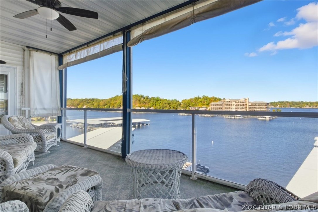 This light-filled condo with three bedrooms and three bathrooms offers a stunning view of the main channel water. situated near the elevator on the fifth floor. The living, dining, and kitchen areas are open, making them perfect for entertaining. A gas corner fireplace is perfect for chilly days. Solid surface countertops, stainless steel appliances, and upgraded kitchen cabinets. The master boasts a jetted tub, walk-in shower, walk-in closet, and dual vanities. The second bedroom has a complete private bathroom. Admire the views from both sides of the screened deck. Turn-key condo offers a 12 x 36 boat slip in front of the condo. Elevator from the unit to the lakefront pool. This sought-after complex features a half-mile coastal promenade, two hot tubs, and three heated pools. Located close to many of the waterfront hot spots, Bagnell Dam Strip, grocery stores, golfing, theater, and shopping.