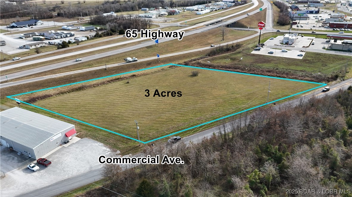 3 Acres of Land in a Prime Commercial Location. High visibility from 65 Hwy, close to a variety of businesses including Grocery store, Restaurants, Hotel, Bank, Medical facilities and others. Good terrain with over 400' of Avenue frontage and all utilities available. Benefit from the Lake Traffic and the Lake Tourism, located Just 1.5 Miles from Truman Lake and Dam, and 1.3 Miles from Lake of the Ozarks.