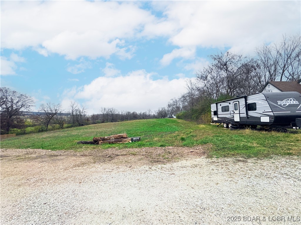 Just off W Bourbon Street, this quarter acre lot provides a straightforward path to building your next home. The land is level, public utilities (water, sewer, and electric) are available at the boundary, and nearby homes contribute to an already-established neighborhood setting. With survey work finished in 2019, it’s an appealing and uncomplicated option for building within Eldon city limits. Multiple lots are available.  Bring your own builder or use ours! Great to hold as an investment property, too.