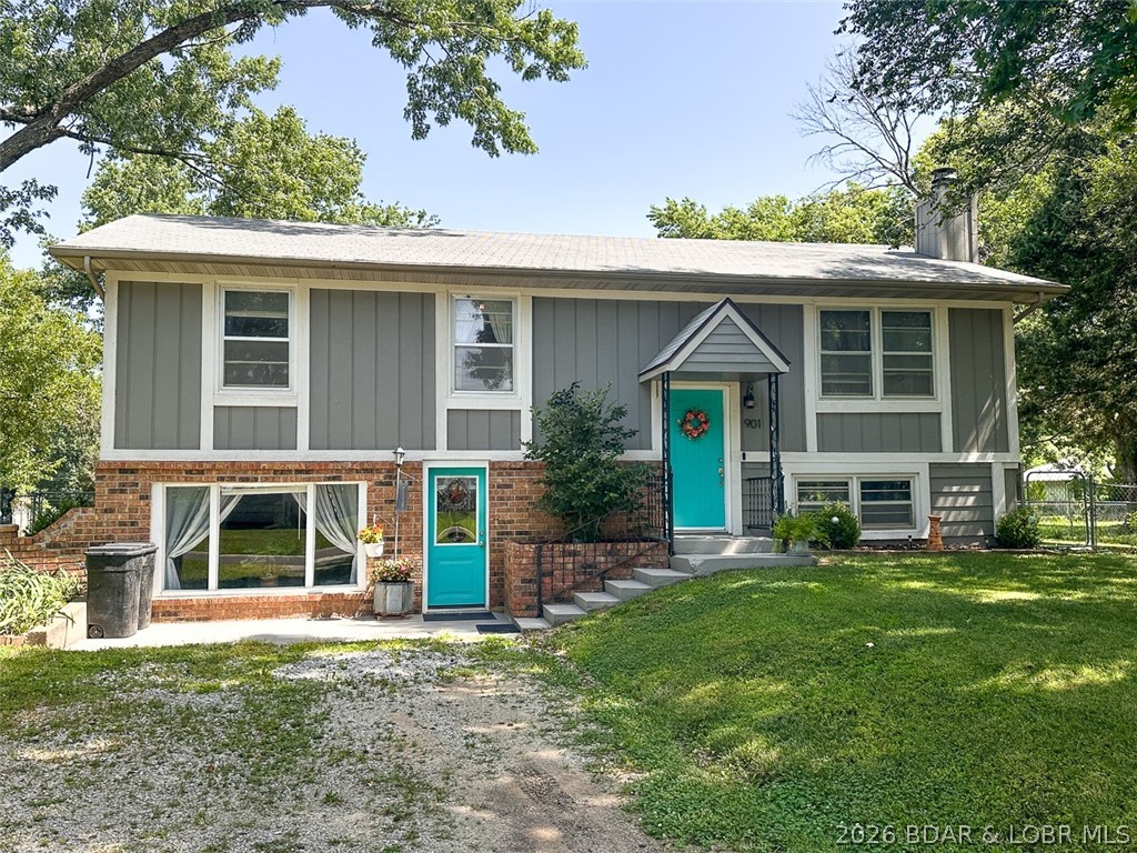 Welcome home to this beautifully updated 4-bedroom, 2-bath split-level home situated on a spacious corner lot in Clinton, MO! Inside, you'll find stylish updates throughout, offering a move-in ready space with room for everyone. The versatile lower-level family room features its own private entrance, making it ideal for a home office, guest space, recreation room, or entertaining. Step outside to enjoy the covered back deck overlooking the large, level, fully fenced backyard complete with mature shade trees and established grapevines that add character and charm. Whether you're hosting friends, gardening, or simply relaxing outdoors, this property offers plenty of space to enjoy. Conveniently located with easy access to local amenities and the historic Clinton Square, this home combines comfort and functionality in one attractive package. Schedule your private showing today!