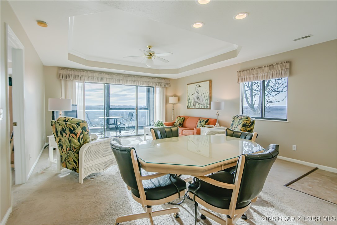 Turn-key 3 bedroom, 3 bathroom condo located in the desirable Osage Vistas complex, perched on a bluff with sweeping views of Lake of the Ozarks. This spacious unit features a highly sought-after lockout design, offering one bedroom and bathroom that can be rented separately or together with the main condo—making it an excellent investment opportunity or flexible personal getaway. Whether maximizing rental income or hosting guests with added privacy, this layout delivers versatility and value. The condo is being sold fully furnished and turn key, allowing you to start enjoying or renting immediately. Osage Vistas offers six outdoor pools, grilling stations conveniently located just outside the condo, and beautifully maintained common areas. The property is shared with the Regalia Hotel, giving owners access to concerts, local events, and the iconic Hippopotamus pool featuring an outdoor swim-up bar at the heart of the complex. Enjoy resort-style living with panoramic lake views, entertainment at your doorstep, and strong rental potential—all in one exceptional Lake of the Ozarks property.