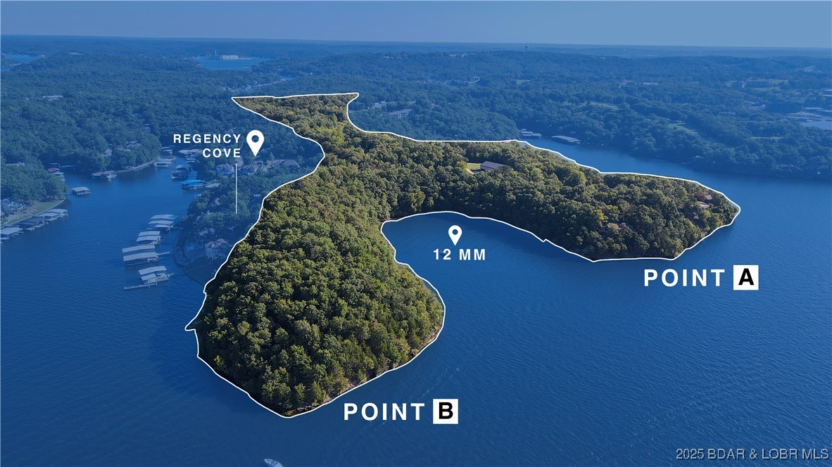 Discover a world of unmatched luxury and privacy at this exquisite lakefront estate, meticulously crafted for those who demand the very best. Encompassing over 36 acres of immaculate land with 3,959 feet of exclusive shoreline on the world-renowned Lake of the Ozarks, this estate is the pinnacle of grandeur. Four exquisite residences, each featuring three opulent bedrooms & spa-inspired en-suite baths, showcase elegance in every detail. The crown jewel of the estate is the expansive 9,600 sq. ft. dock, perfect for hosting lavish gatherings, complete with a state-of-the-art chef's kitchen, three 75-foot boat slips, & dual wave breaks to keep your vessels secure. Additionally, a 6,300 sq. ft. garage offers plenty of parking for 15+ vehicles and a helicopter. Unwind on overwater decks with breathtaking lake views, or enjoy the estate's luxurious amenities: a state-of-the-art fitness center, scenic walking trails, serene Japanese gardens, clay tennis court, and miles of four-wheel and walking trails weaving through the entire property. With abundant space to expand and create custom amenities, this property offers endless possibilities for personalizing your own paradise.