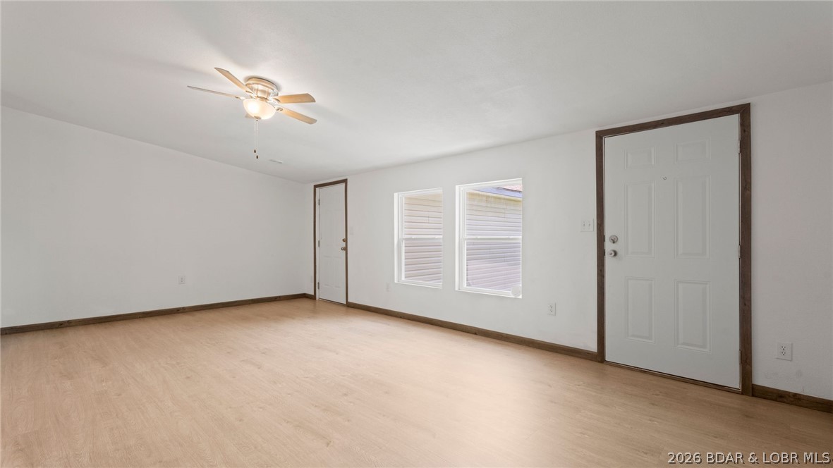 Escape the hustle yet stay close to everything you need in this freshly reconstructed 3-bedroom, 2-bath home located in the highly regarded School of the Osage school district. The home features dramatic vaulted ceilings that create an open, airy feel throughout the living space. Enjoy the convenience of an attached 2-car garage and the peace of a quiet atmosphere, all while being minutes from restaurants, shopping, and everyday amenities. Located just outside city limits, this property offers the perfect blend of affordability, modern updates, and a relaxed lifestyle in the heart of Lake of the Ozarks.