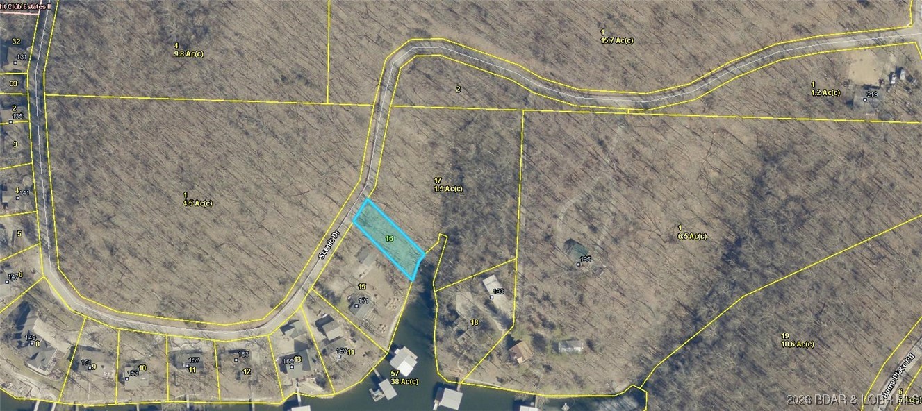 Check out this Lakefront lot at an unbeatable price! This rare opportunity offers a lakefront lot at the 3 Mile Marker in the highly desirable Yacht Club Estates Subdivision, providing a peaceful and tranquil setting for your custom lakefront home. Situated in a cove-protected location, the lot features calm waters and beautiful lake views, making it ideal for boating, relaxing, and enjoying the lake lifestyle. Located within the School of the Osage District and just minutes from historic Bagnell Dam, as well as the area’s best shopping, dining, and entertainment, this property offers both convenience and serenity. Wake up each day to the sights and sounds of the lake while enjoying the privacy only a cove location can provide! Where else can you get a Lakefront Lot at this price? Don't miss out on this amazing opportunity!