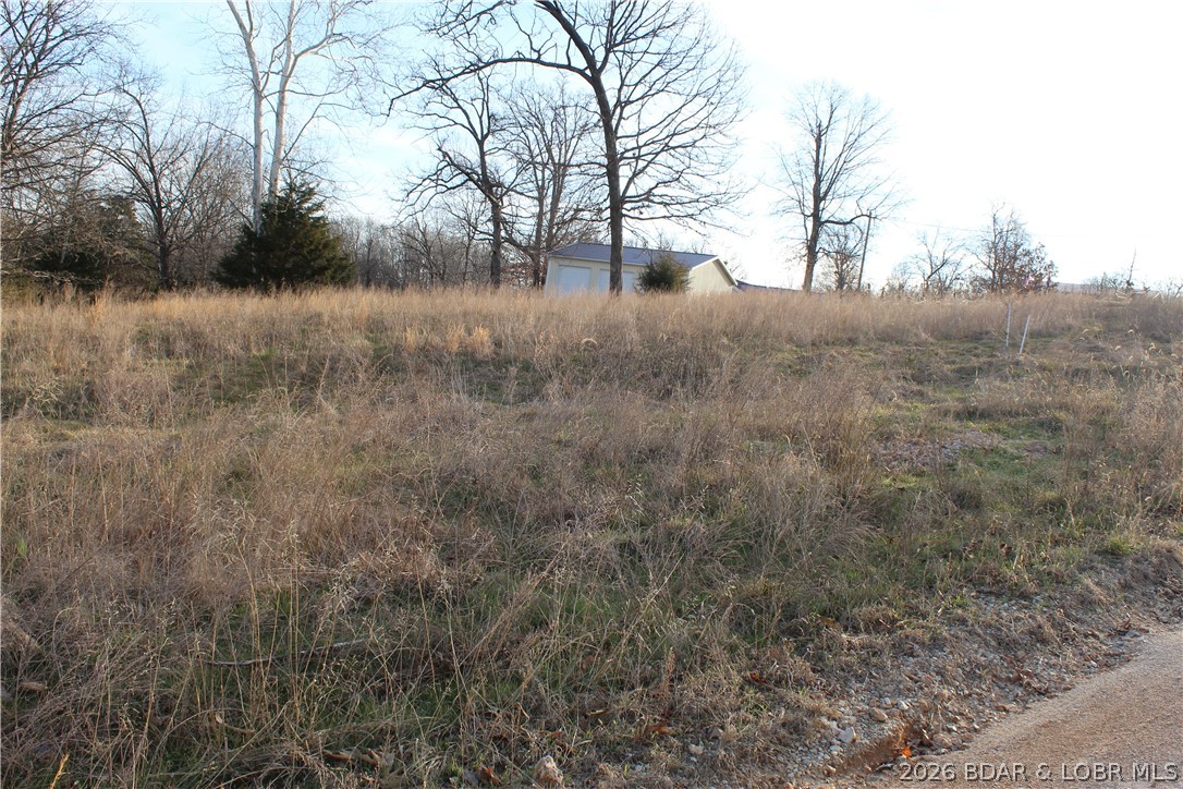 Nice lakeview lot in Johnson's Bay Subdivision. Community water and sewer help reduce costs to build your dream home at Lake of the Ozarks.