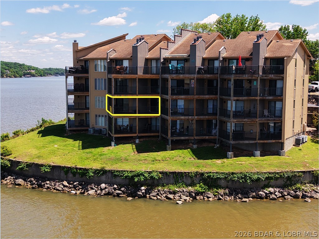 Not many condos at this price point offer views that stretch this far across the main channel. This isn’t a high-density concrete complex—it’s a place where you know your neighbors, recognize familiar faces at the pool, and enjoy the consistency that comes with pride of ownership and low turnover.

With short-term rentals not permitted, the setting remains quiet and relaxed, making it ideal for weekend getaways or full-time lake living.

Inside, the condo is truly turn-key and fully furnished, ready to enjoy from day one. The open living space flows naturally toward the water, with expansive lake views that become the focal point the moment you walk in.

Now offered at an improved price, this is an opportunity to secure a lakefront property with strong positioning in today’s market—whether you’re looking for a personal retreat or a place to settle into the lake lifestyle.

Spend your mornings on the deck, afternoons by the pool, and evenings taking in the view—this is the kind of place that feels like home the moment you arrive.