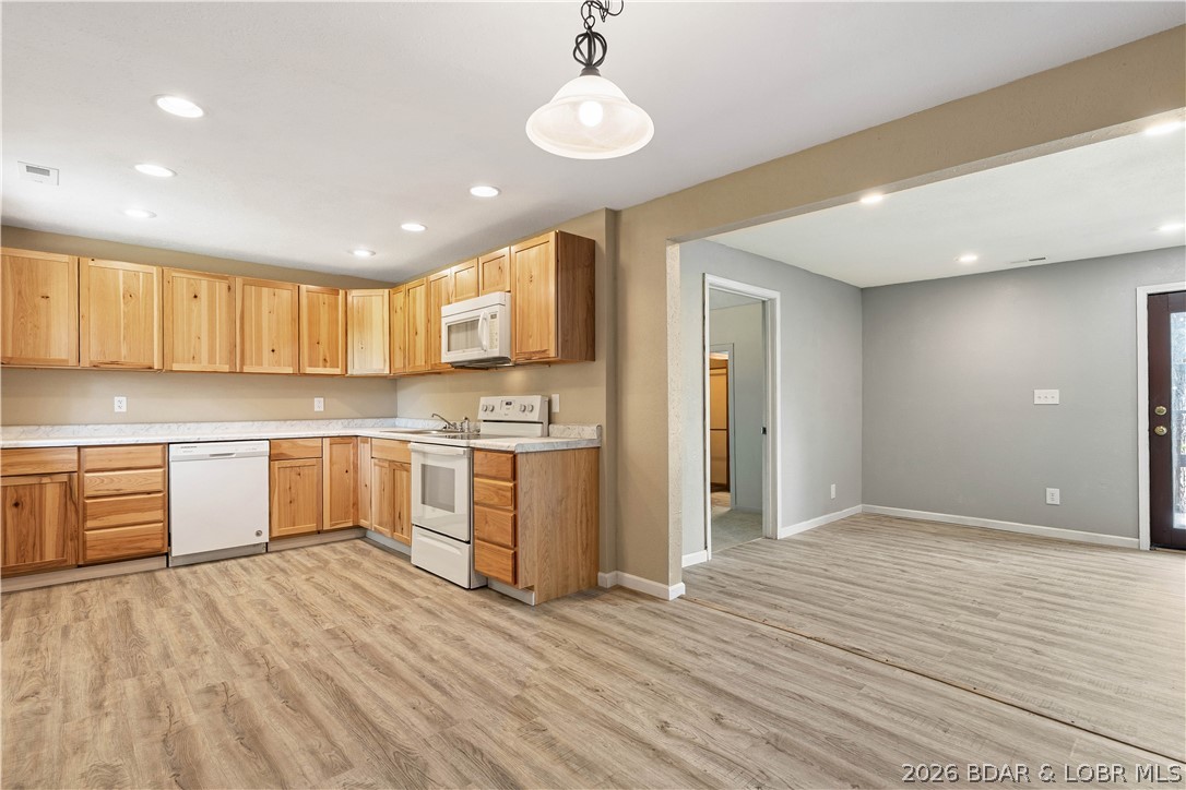 Completely remodeled and move-in ready, this Camdenton ranch offers exceptional value. Bright and modern throughout, the home feels like new without the new-construction price—featuring 3 bedrooms, 2 full baths, an updated open layout, new HVAC, new water heater, and numerous recent upgrades. Well-maintained and stylish, this property is hard to find in such a desirable location, close to shopping, schools, and all that Lake of the Ozarks offers. Ideal as a primary residence, investment, or weekend retreat—don’t miss this fully updated opportunity.