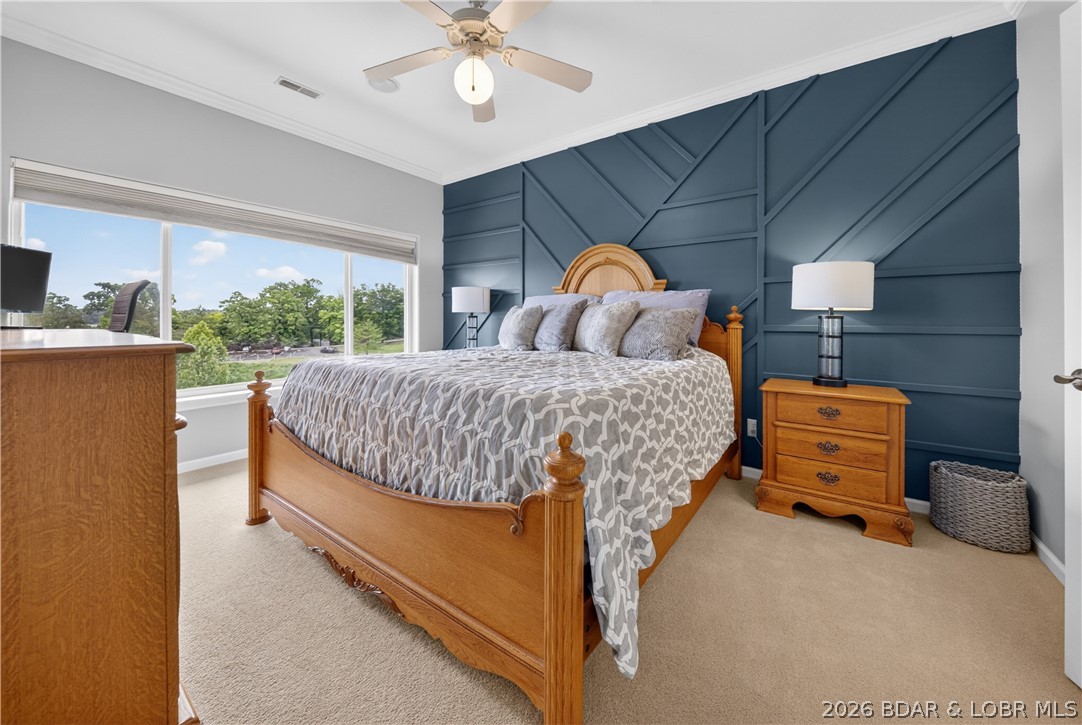 Experience effortless lakefront living in this top-floor 3-bedroom, 3-bath condo at the highly sought-after Monarch Cove Condominiums! Located at the 2 MM in the heart of Lake Ozark, this prime lakefront location puts you just minutes from the area’s top waterfront restaurants, entertainment, shopping, and attractions, so you’ll never miss out on the fun. Inside, the spacious open-concept floor plan is designed for comfortable living and easy entertaining, while expansive windows and an oversized covered deck showcase stunning lake views. Enjoy the convenience of elevator access from the parking lot directly to your front door, making every trip effortless. This condo also includes your very own 12x36 boat slip and PWC slip, giving you instant access to all the lake adventures Lake of the Ozarks has to offer. Whether you’re looking for a full-time residence, vacation getaway, or investment property, this condo delivers the perfect combination of comfort, convenience, and unbeatable lakefront living. Monarch Cove also offers resort-style amenities including multiple pools, waterfront boardwalks, and easy access by both land and water. View virtual tour!