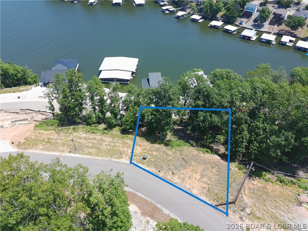 Lots are now ready for you to build your dream home at one of the Ozarks hottest new subdivisions, The
Waters. The Waters is located at Horseshoe bend on the 3 MM of the lake. There are 27 different lot locations
and each have their own unique layout and characteristics. Second tier lots will have the ability to buy boat
and/or jetski slips in the brand new community dock going in on lot 8 as well. Take your once in a lifetime
opportunity to build your dream home at The Waters today!