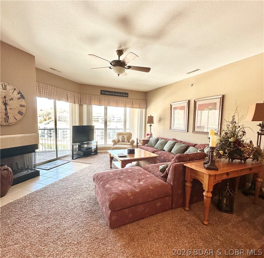 SHORT-TERM RENTALS ALLOWED! Whether you're looking for an income-producing investment, weekend getaway, or full-time lake home, this turnkey condo offers the flexibility buyers want.

This fully furnished TOP FLOOR, END UNIT condo features 3 bedrooms, 2 baths, an open living area with fireplace, and a spacious deck perfect for relaxing or entertaining. Located in the highly desirable Horseshoe Bend area at the 12 MM, you'll be just minutes from popular waterfront restaurants, bars, golf courses, and attractions.

A 12x30 boat slip with a 10,000 lb lift is included, along with access to the community pool and well-maintained grounds. Most furnishings stay, making this a true move-in or rental-ready opportunity. A 2006 Sea Ray 270 Sundeck is also available for purchase separately.