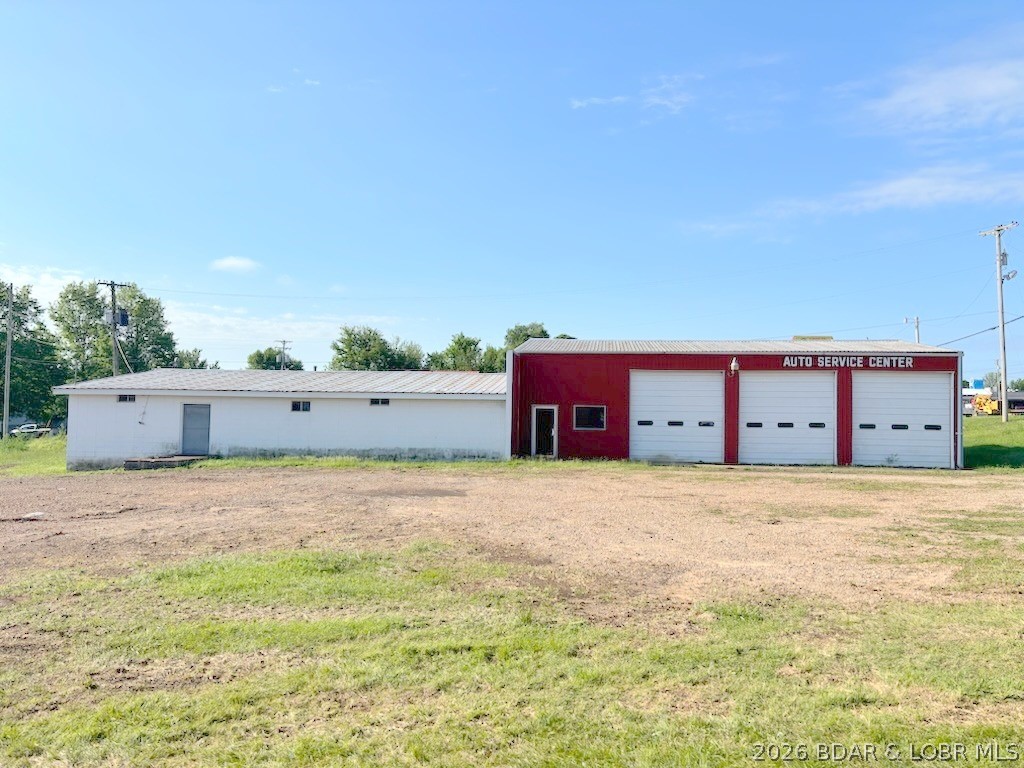 Perfect Location in Buffalo for your Business. Highly visible with 130 Feet of Highway Frontage on US 65 close to junction 65-32 intersection. Would be a great Location for any type of Business. Main Building has 3,850 SF and has been used for Service Business, Laundromat and Retail. There is an Office, 3 large Overhead Doors and 1 Bathroom. Back Room was used as a Machine Shop.  Concrete Flooring and is on City Water and Sewer. MoDot Traffic Count is 15,000+ cars per day. Motivated Seller, bring Offers.