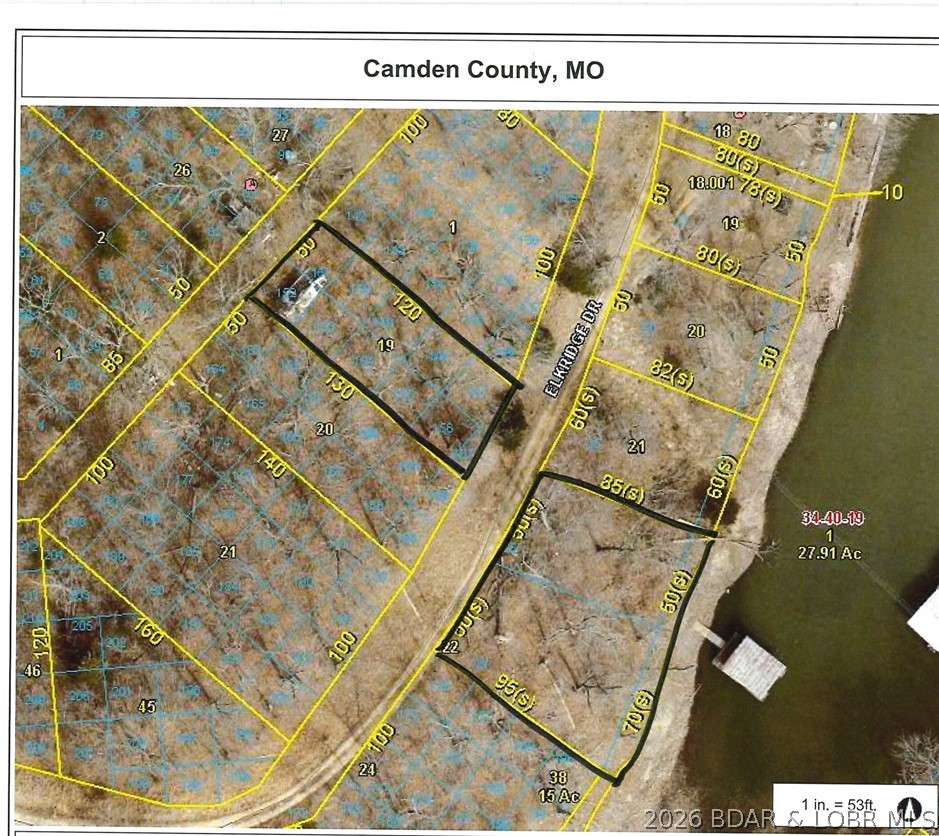 Looking for lots with no HOA, cove protection, and easy access to the main channel? These lots at the 61 MM are located in a quiet cove offering a great place to build a home, or just come enjoy everything the Lake has to offer. Public boat ramps are just around the mouth of this cove and restaurants and attractions are nearby! Dock is negotiable, Owner has spoken to Septic company and states that there are different septic options available for these lots. The large interior lot 19 can be used for a garage or car parking space. Survey on file.