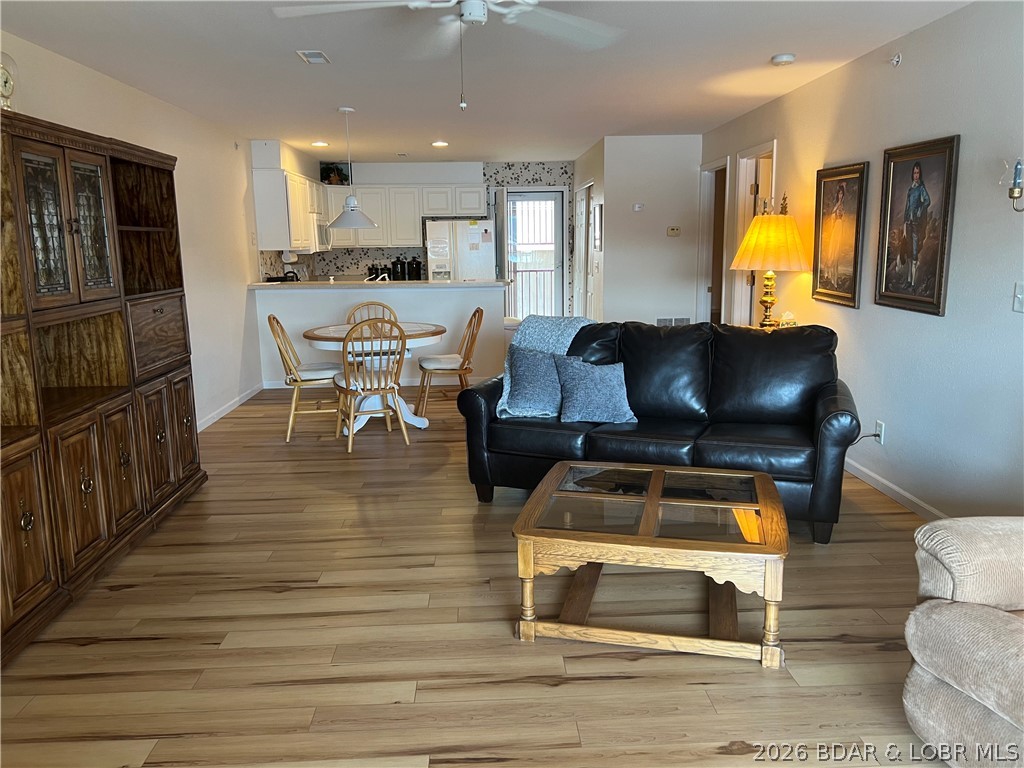 ***Garage Available*** Start your lake adventures in this 2-bedroom, 2-bath waterfront condo that offers lake views & the perfect blend of comfort, convenience, and lake lifestyle living. Featuring an open-concept floor plan, this inviting condo is ideal for relaxing weekends, full-time living, or a vacation retreat or nightly rentals. 

MORE PHOTOS TO COME - For video and more photos of complex, go to: Clearwater Condominiums at Lake of the Ozarks _ COA in Camdenton, MO  or  https://www.youtube.com/watch?v=ARrOifkM4T0&t=99s
The master bedroom offers lake views, access to the deck, ample closet space, and a private bath with dual sinks, while the second bedroom and full guest bath provide plenty of room for guests. Included with the property is a boat slip so you can spend your days enjoying everything lake life has to offer.

Located in a desirable waterfront community, this condo is truly move-in ready and designed for effortless lake living for a weekend retreat, investment opportunity, or your own slice of paradise on the water, and checks a lot boxes.