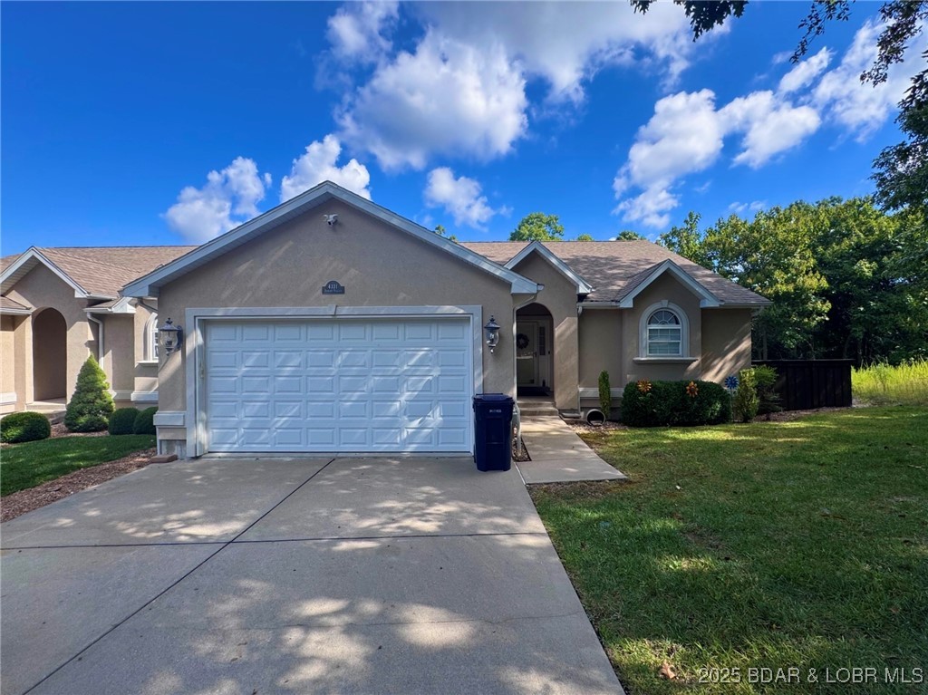 PRIME LOCATION in the heart of Osage Beach! IMPECCABLE CONDITION=LAKE LIFE PERFECTION.Nestled in one of the most sought-after areas,beautifully maintained home is just minutes from shopping,dining & entertainment.From the moment you arrive,the pristine exterior & inviting covered entry set the tone for what’s inside.Step into an open layout filled w/abundant natural light,vaulted ceilings,& recessed lighting throughout.The kitchen is a true gem-stainless appliances,extensive cabinetry,expansive countertops,a stylish stone backsplash,& a breakfast bar ideal for entertaining.The living room is warm & welcoming, anchored by a striking stone-surround electric fireplace-adds both style & cozy ambiance.Generously sized primary suite-a private retreat,w/a spa-inspired bath showcasing a dec. tile walk-in shower,dual vanity,tile flooring,& an oversized mirror.Outdoor living on 2 composite decks-1 covered-accented w/sleek metal railings & perfect for relaxing or hosting.The lower level shines w/modern LVP flooring, while the fenced, low-maintenance backyard means more time to enjoy the lake. Included is the flexibility of a 4 bedroom(non-conforming).Added bonus long term rentals are allowed!