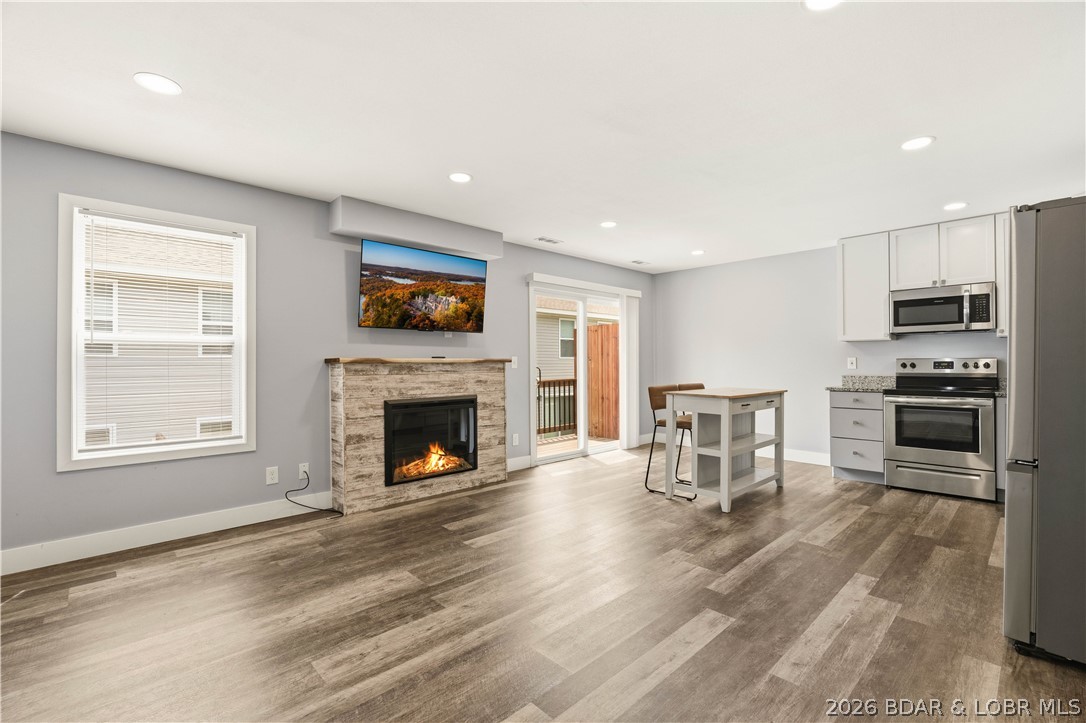 Welcome to easy living at Cool Water Townhomes! This newer construction 3-bedroom, 2.5-bath townhome with a 1-car garage offers the perfect blend of style, comfort, and convenience. Featuring modern finishes, a functional open layout, and a private back patio that's perfect for grilling or relaxing, this home is designed for everyday living. Located just off Y Road in the heart of Lake of the Ozarks, you'll enjoy quick access to shopping, dining, schools, and all the area's top attractions. The affordable HOA makes ownership even easier by covering central water and sewer, lawn care, community pool, trash service, and road maintenance—allowing you to spend more time enjoying the lake lifestyle and less time on upkeep. Whether you're looking for a full-time residence, a weekend retreat, or an investment property to add to your rental portfolio, this townhome checks all the boxes. Enjoy the benefits of maintenance-free living in one of Linn Creek's most convenient locations!