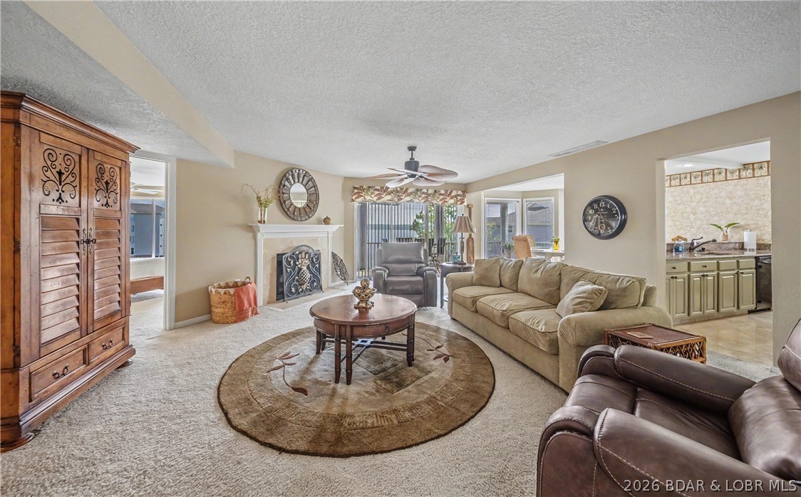 Enjoy stunning lake views from your screened-in deck overlooking the 12 Mile Marker in this beautifully maintained, walk-in level condo! This fully furnished, turn-key unit is ready for immediate use or investment, complete with upscale furnishings down to the cookware, dishes & more. This unit offers 3 bedrooms, 3 full baths and over 1,800 sq ft of living space. The oversized primary suite is a true retreat, boasting floor-to-ceiling windows, private access to the screened-in porch & a spa-like bathroom complete with a jetted tub and separate walk-in shower. Two guest bedrooms down the hall with one bedroom complete with an en-suite. The kitchen features granite counters, custom tile flooring and custom cabinets. Included is a 12x30 boat slip making it easy to enjoy everything the lake has to offer. Regatta Bay offers a park-like setting with resort-style amenities including tennis & pickleball courts, a BBQ pavilion, playground, 2 saltwater pools, a swim dock & additional picnic areas. Located in the Four Seasons area on Horseshoe Bend Pkwy, you’re just minutes from popular lake attractions by land or water. Short-term rentals are allowed, making this an excellent opportunity!