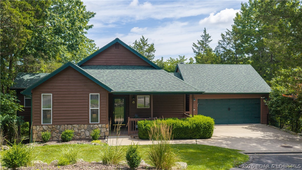 Completely remodeled, fully furnished, and truly turnkey, this Old Kinderhook Golf Resort home is ready for immediate enjoyment at Lake of the Ozarks. Thoughtfully updated throughout, the home offers a bright sunroom, open floor plan, soaring ceilings, and a spacious great room anchored by a stunning stone fireplace. The updated kitchen features an oversized quartz island, stainless steel appliances, tile backsplash, built-in power and USB outlets, and a dedicated coffee bar. The layout includes 2 bedrooms plus a private office with French doors, creating flexible space for work, guests, or additional use. A 2-car attached garage adds everyday convenience and storage, while the impressive crawl space with vapor barrier provides added peace of mind. Old Kinderhook offers access to golf, pools, tennis courts, sand volleyball, and a seasonal winter ice skating rink. Whether used as a full-time residence, weekend getaway, or Lake area investment, this property delivers a polished, low-maintenance lifestyle in one of the area’s premier resort settings.
