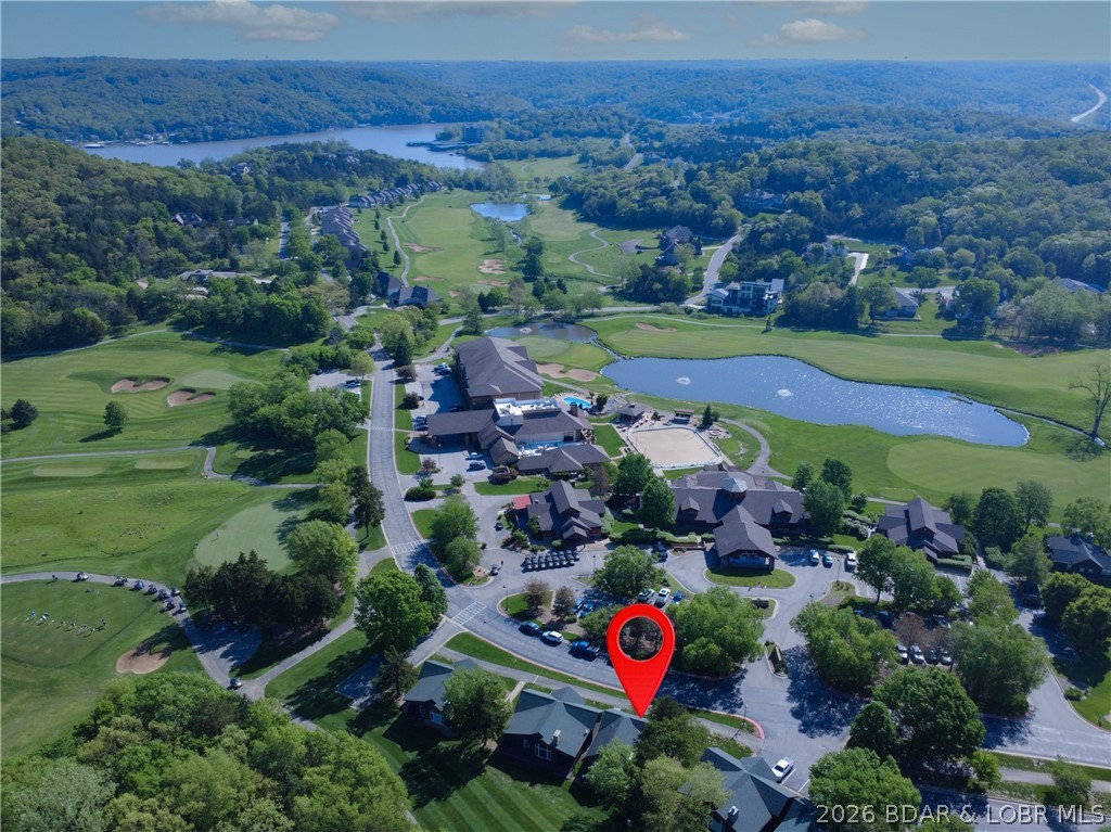 Experience resort-style living in this spacious 1 bed, 1 bath cottage in the prestigious Old Kinderhook community at Lake of the Ozarks. Offering approx. 1044 sqft of living space, this fully furnished, turnkey property is ideal as a full-time residence, weekend retreat, or income-producing rental with strong appeal. The home features a spacious living area, along with a tiled bathroom, entryway, and kitchen that provide durability, style. Designed for convenience, the property also includes room for golf cart parking for quick access throughout the community. Step outside to your private back deck located directly next to the Hole #1 tee box—true golf course frontage with unbeatable access and scenic views. The large bedroom includes king size and trundle beds as well as a double closet. The oversized bathroom offers a walk-in shower, soaking tub, double vanity, and additional linen cabinet. Enjoy a championship golf course, pools, dining, fitness center, pickleball, cafe, spa, and year-round recreation within a few minute walk from your front door—delivering the perfect blend of luxury, lifestyle, and rental potential. Offering $3500 for upgrades of your choice! Call me today!