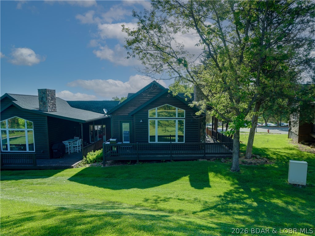 Experience resort-style living in this spacious 1 bed, 1 bath cottage in the prestigious Old Kinderhook community at Lake of the Ozarks. Offering approx. 1000 sqft of living space, this fully furnished, turnkey property is ideal as a full-time residence, weekend retreat, or income-producing rental with strong appeal. The home features a spacious living area, along with a tiled bathroom, entryway, and kitchen that provide durability, style. Designed for convenience, the property also includes room for golf cart parking for quick access throughout the community. Step outside to your private back deck located directly next to the Hole #1 tee box—true golf course frontage with unbeatable access and scenic views. The large bedroom includes king size and trundle beds as well as a double closet. The oversized bathroom offers a walk-in shower, soaking tub, double vanity, and additional linen cabinet. Enjoy a championship golf course, pools, dining, fitness center, pickleball, cafe, spa, and year-round recreation within a few minute walk from your front door—delivering the perfect blend of luxury, lifestyle, and rental potential. Offering $3500 for upgrades of your choice! Call me today!