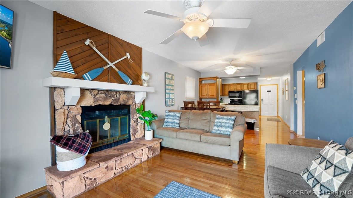 Affordable, rentable, and perfectly positioned on the lake—this walk-in condo checks all the boxes! With just two easy steps from the parking lot, convenience meets comfort from the moment you arrive. Enjoy beautiful 4MM views from your private deck, with access from both the living room and the primary bedroom. Inside, you’ll find a cozy fireplace and a functional layout designed for both personal use and investment. The lockout feature with a second entry door creates excellent income-producing potential, allowing for flexible rental options. This unit is being sold fully furnished, with only a few personal exclusions, making it truly turn-key. Community amenities include a pool, and you’re just steps from Dock Knockers and Wheel House Marina, where boat slips are available to rent—making it easy to start enjoying the Lake lifestyle right away. Nightly rentals allowed.
