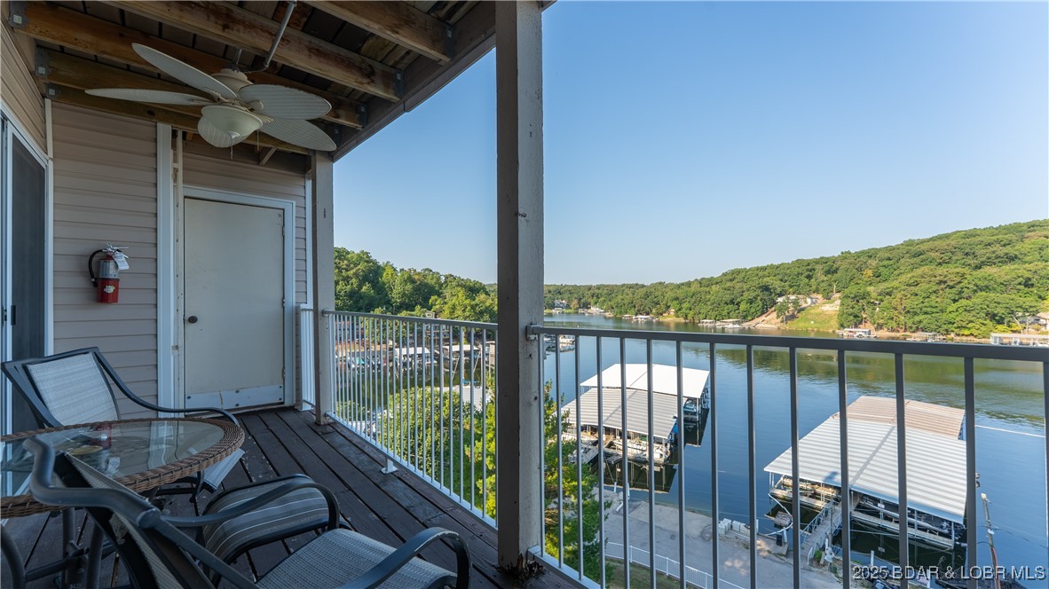 Affordable, rentable, and perfectly positioned on the lake—this walk-in condo checks all the boxes! With just two easy steps from the parking lot, convenience meets comfort from the moment you arrive. Enjoy beautiful 4MM views from your private deck, with access from both the living room and the primary bedroom. Inside, you’ll find a cozy fireplace and a functional layout designed for both personal use and investment. The lockout feature with a second entry door creates excellent income-producing potential, allowing for flexible rental options. This unit is being sold fully furnished, with only a few personal exclusions, making it truly turn-key. Community amenities include a pool, and you’re just steps from Dock Knockers and Wheel House Marina, where boat slips are available to rent—making it easy to start enjoying the Lake lifestyle right away. Nightly rentals allowed.