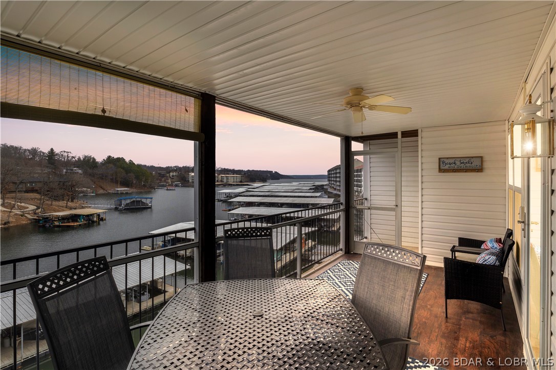 Sunrise Suite at Lighthouse Landing is a successful, income-producing vacation rental located at the 1 Mile Marker of Lake of the Ozarks. This waterfront 2-bedroom, 2-bath condo offers strong rental history and an unbeatable location just minutes from the Bagnell Dam Strip, Osage Beach, lakefront restaurants, and boat rentals.

The open-concept layout features a kitchen with stainless steel appliances, dining area for four, and a spacious living room with electric fireplace and lake views. Both bedrooms offer king-sized beds, including a lakeview primary suite with private bath. A second full bath provides added convenience for guests.

Enjoy the screened-in waterfront balcony with ample seating, perfect for relaxing after a day on the water. The complex includes a community pool and swim dock, and this unit comes with a 12x28 boat slip. Ideal as a personal lake retreat or turnkey investment property in a high-demand area.