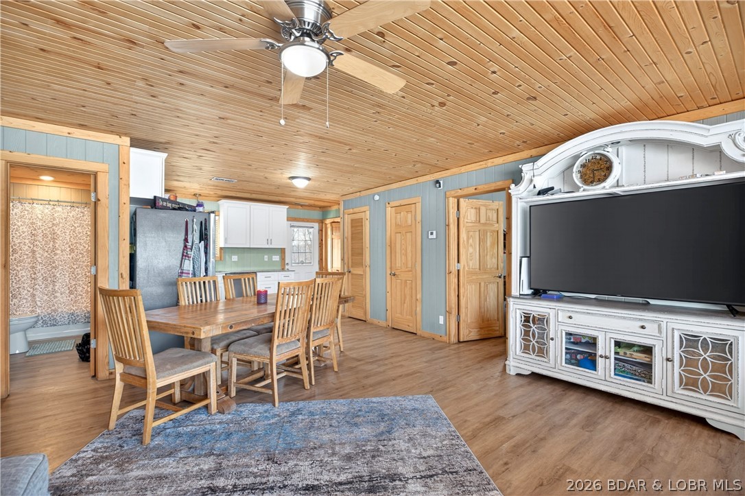 31962 Georgia Rd in Gravois Mills is a place to slow down and savor a little more space, set on 3.10 acres with a mix of open ground and woods for privacy and play. Built in 2020, this charming one-level home offers approx. 1,200 sq ft with 3 bedrooms and 2 baths, featuring easy-care laminate flooring, ceiling fans, a pantry, and a comfortable primary suite with a walk-in closet and walk-in shower. Step onto the covered deck for fresh-air mornings and laid-back evenings, then slip into the hot tub and let the day melt away. A greenhouse invites you to grow, tinker, and enjoy the outdoors at home.

The 40x60 detached shop/garage takes the lifestyle even further with 3 bays, an RV door, concrete flooring, and plenty of space for projects, storage, and toys. A studio apartment on the main level adds flexible bonus space for guests, hobbies, or a home office. City sewer hookup coming soon—another convenience to add value and future ease. Seller is offering $5,000 in concessions toward buyer closing costs.