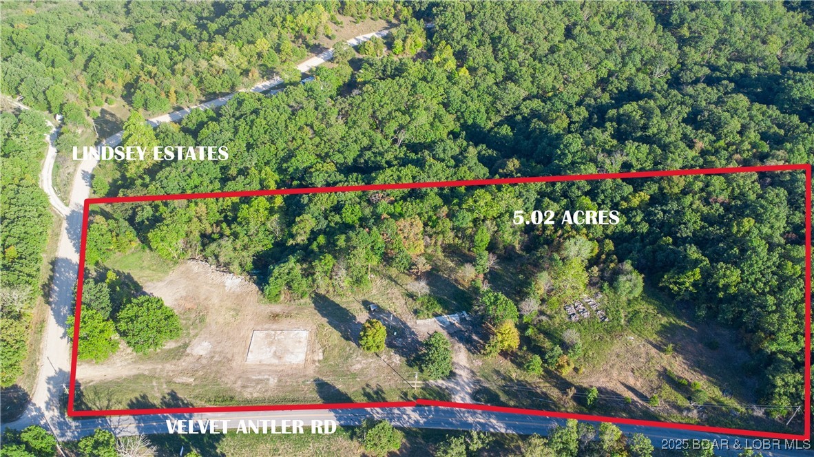 3 Mins from Heart of Greenview Area, 5.02 Acers Zoned Light INDUSTRIAL(I-1) mostly cleared w/ Great Visibility & Easy Access to property. Minimal Excavation needed. 1 of the very few & HARD TO FIND Vacant Parcels “Zoned I-1” available in ALL of the Lake’s MLS. Surveyed w/Corners marked in 2022. Mostly Flat, Vacant & Cleared. Includes 995.22 Ft of Road Frontage w/Extremely Easy Access into Property off of Blacktop for Large &/or Heavy Equipment, Boats, etc! Electric & Well on Property. Mostly a BLANK SLATE w/ Open Acreage & Some Wooded area for a Buffer from Neighbor'g Properties. This property is Ideal for an Excavation Co. w/Lrg Equipment, Storage Units, Marinas & Boat Storage, Multi Family Housing, New Home Construction, Blue Collar Businesses, Convenience Store, RV Park, etc. Only 1/2-1 Mile to Lake. 3-10 Minutes to Dining, Groceries, Banks, Convenience Stores, Popular Waterfront Restaurants. Several Businesses have recently Popped-up, Relocated or Opened New, along the Highways in the Greenview Area & it is becoming Visibly Noticeable that the Area is becoming a Desirable, Newer & Upcoming Business District, resulting in greater demand from Commercial & Industrial Businesses.