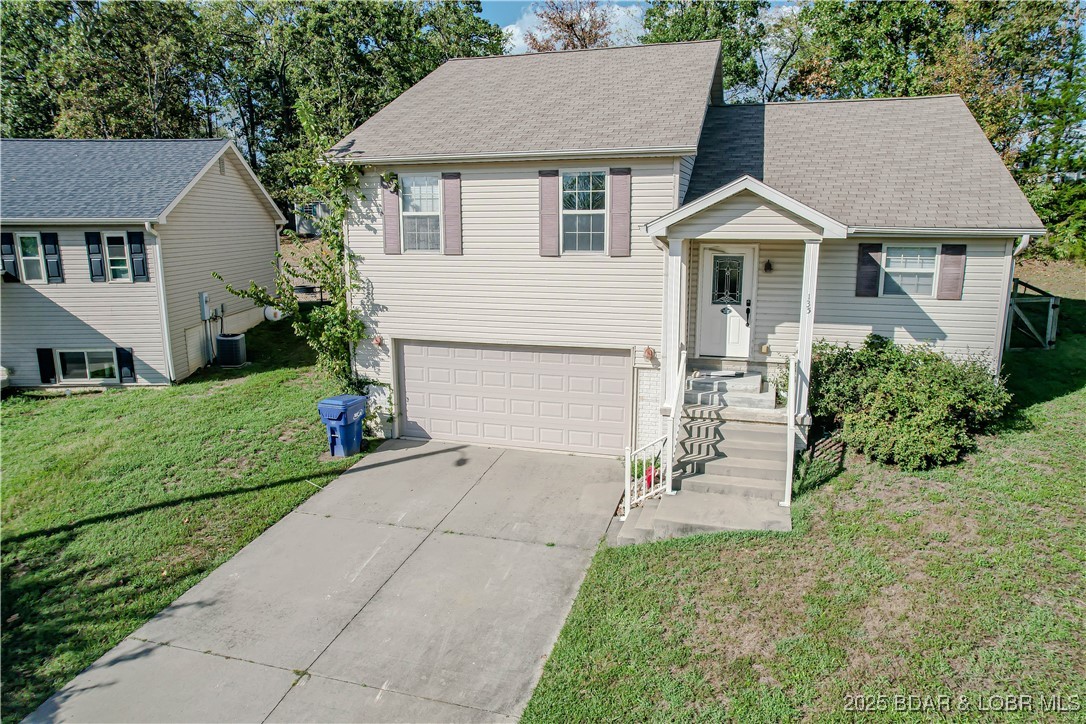 Welcome to 135 Primrose Lane in Camdenton! This beautifully updated 3 bedroom, 2.5 bath home features a 2-car garage and a basement, offering extra storage and functional space. In 2024, the main flooring and master bathroom were remodeled with new LVP and fresh carpet, giving the home a clean and modern feel. The kitchen comes fully equipped with all appliances, making it truly move-in ready. Outside, you’ll love the fenced-in backyard—ideal for pets, kids, or relaxing afternoons. With no monthly assessments or HOA fees, you can enjoy neighborhood living without the extra cost. Located in a quiet area just minutes from downtown Camdenton, you’re close to shopping, schools, and some of the lake’s favorite restaurants. If you're looking for an updated home with a garage, basement, and zero community fees in a peaceful, convenient location, this one checks all the boxes!