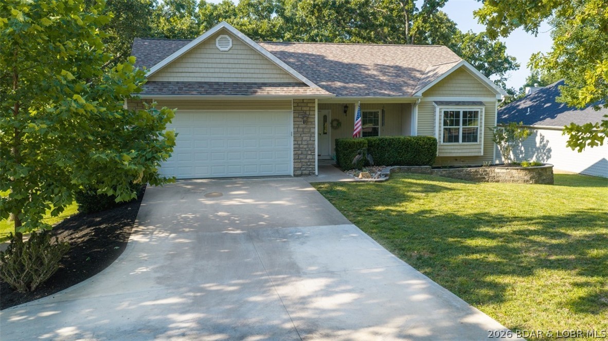 Experience comfort, convenience and modern updates in the heart of Osage Beach ideally located just minutes from shopping, dining, entertainment, schools, & Lake Regional Hospital. This beautifully updated 5-bedroom, 3-bath home offers the perfect blend of style & functionality with NO HOA!!!
Step inside to find an open floor plan, soaring ceilings, abundant natural light & all new flooring. The spacious main-level primary suite offers a walk-in closet & private bath.  The lower level walk-out features 9 foot ceilings, a large family room and a 4th bedroom & bath. A 5th non-conforming bedroom is perfect for a home theater, bunk room or craft room.
Situated on a generous half-acre lot backing to the former Sycamore Creek Golf Course, the backyard offers a peaceful, park-like setting with mature shade trees and gentle topography. Enjoy both screened & open decks, ideal for relaxing or entertaining in every season.
