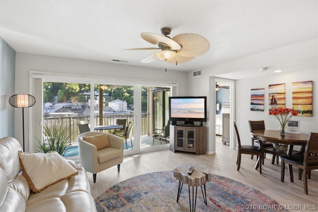 Welcome to lake life made easy! This beautifully updated 2 bed, 2 full bath condo at the Lake of the Ozarks comes fully furnished and is truly move-in ready—just bring your suitcase and start enjoying the view. Updated in 2021, this unit features modern finishes, an open and inviting layout, and plenty of natural light throughout.

Step out onto your covered deck and take in the stunning lake views—perfect for morning coffee or unwinding at sunset. Boating enthusiasts will love the included boat slip, offering effortless access to the water.

Located on the main level with only a few steps to the entrance, this condo offers convenience and accessibility. The community amenities are just as impressive, featuring an inground pool, clubhouse, and tennis courts—everything you need for a resort-style experience.

Whether you’re looking for a weekend getaway, investment opportunity, or full-time lake living, this one checks all the boxes!