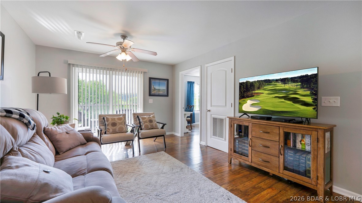 Welcome to The Pines at Osage National Golf Resort! This end unit condo has 2 bedrooms, 2 bathrooms with a screened in deck overlooking the course.  Freshly painted with LVP flooring, new HVAC and washer/dryer, there’s nothing to do but enjoy!  Includes two assigned parking spaces and plenty of overflow parking for guests.  With so many options, you'll be ready to enjoy the season with full time or second home living, place on the Stay N Play rental program or AirBnb it yourself. The location is unbeatable off Hwy 54 in Lake Ozark close to shopping, dining and lake access. This beautifully maintained course, with 27 signature holes, is popular year-round and memberships are full and currently only available to homeowners, which adds so much value to this condo. Fantastic amenities include a zero-entry pool that is heated and cooled (when needed), Eagle View Bar & Grille, Clubhouse and Pro Shop, 24 hour fitness center, driving range, putting and chipping greens, and event venue. If you also enjoy boating, fishing and water sports, it's just minutes from the lake and local marinas. This condo is truly a complete package for both golf enthusiasts and lake lovers!