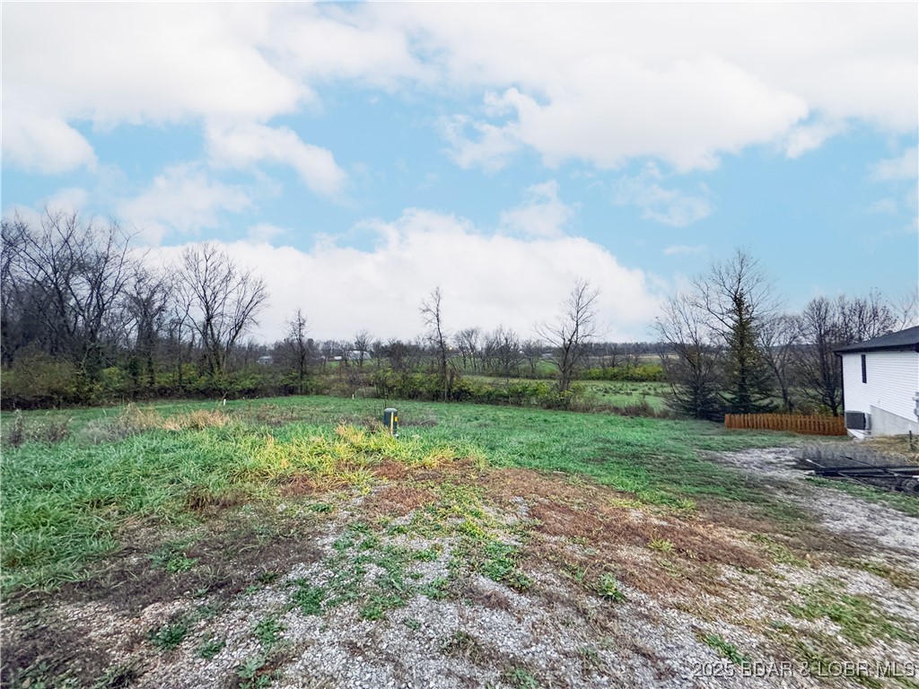 A clean, build-ready  lot in a convenient Eldon location—just off W Bourbon Street. The property offers level terrain and direct access to public water, sewer, and electric at the boundary. With the survey work finished in 2019 and established homes nearby, it’s an easy choice for anyone wanting a straightforward residential build site within the city. Excellent potential for a starter home, downsizing, or investment construction. There are multiple lots to choose from.  You can use our builder or bring your own.  What a great place to build! Eldon offers industry, shopping and a great community. Take a look!