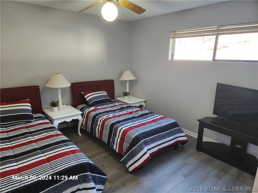 The only 3 Bedroom Condo on the property that is walk in level from the parking lot.  Relax on the back deck and enjoy amazing Sunrise/Sunset.  Easy access to both the Lakefront Pool and the swim dock.  While it is parking lot level at the entrance, you will enjoy breathtaking views from the 3rd level on the lake side.  Complete renovation in the last 3 years including lights, floors, and appliances.  Spacious back deck with room for entertaining guests.  Easy access to the lake with included boat slip.  In addition to luxury living, condo comes with complete turnkey VRBO business. Other amenities include Indoor Pool, Outdoor Pool, Swim Dock