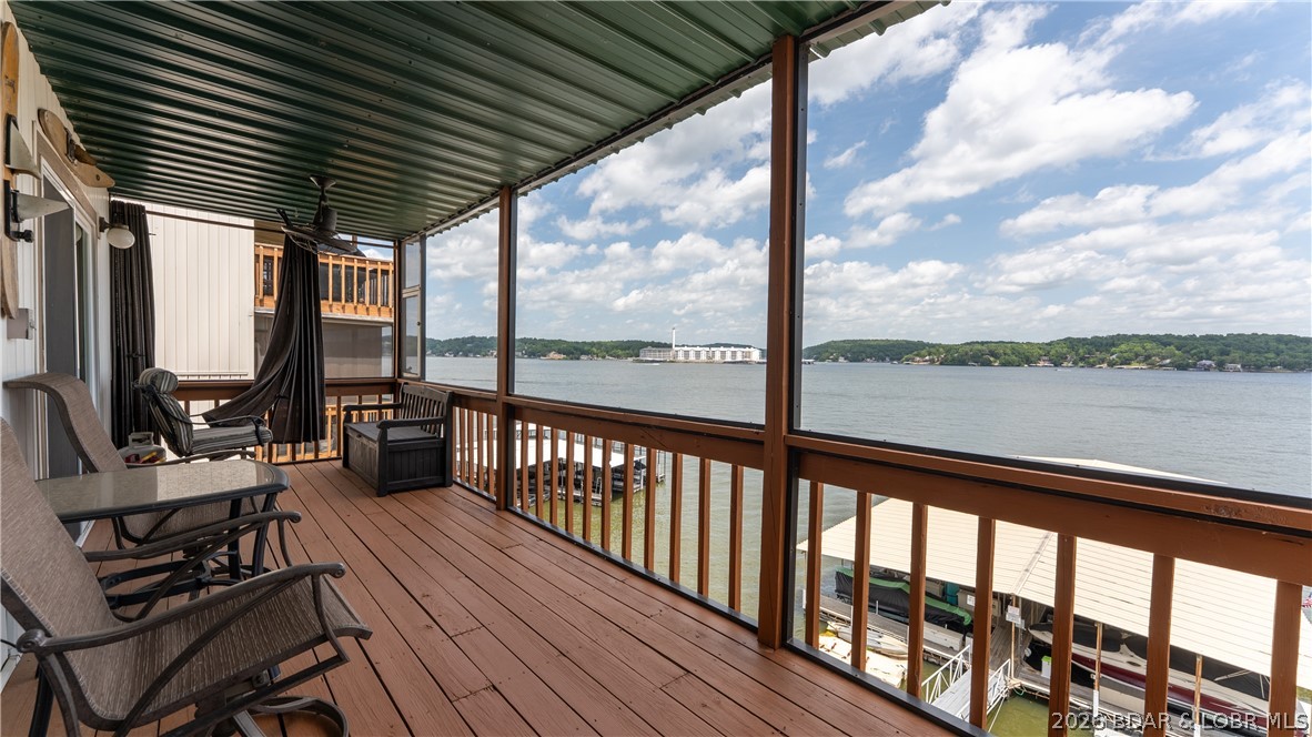 Lakefront living with TWO 10x24 dock slips available for purchase—a rare opportunity at this price point! Whether you're searching for a weekend getaway, full-time residence, or income-producing investment, this updated 1-bedroom, 1.5-bath condo checks every box. With nightly rentals allowed, you have the flexibility to enjoy it yourself while generating rental income when you're away. Relax on the spacious covered deck overlooking the main channel or spend your days on the water just steps from your door. Located in the heart of Lake Ozark, you're minutes from some of the lake's most popular destinations including Shady Gators, H. Toad's, Dog Days, Baxter's Lakeside Grille, JB Hook's, Redhead Lakeside Grill, and The Fish & Company, plus shopping, golf, entertainment, and the historic Bagnell Dam Strip. Whether you're boating, dining, or soaking up the lake lifestyle, this is an affordable opportunity to own in one of the most desirable areas of the Lake of the Ozarks.
