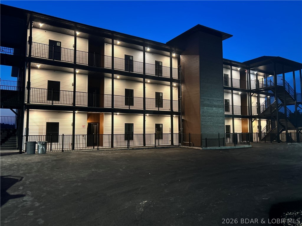 Welcome to the newest building at Robin’s at the Water’s Edge—one of the most premier destinations at Lake of the Ozarks! These brand-new 3 bed, 3 bath (all en-suites) units are designed for comfort and style, with open-concept layouts, upgraded flooring, granite or quartz tops throughout, and 8’ sliders leading to spacious covered concrete decks with stunning lake views. The lakeside master suite features a tiled shower and double vanity. Located at the 1MM on the Grand Glaize Arm, you'll enjoy gentle lakefront access and breathtaking main channel views. This ideal Osage Beach location puts you close to dining, shopping, and the State Park—perfect for boating, skiing, tubing, and fishing. Robin’s offers exceptional amenities including two private pools, a sandy beach, a covered/enclosed fishing dock, private boat ramp, and community docks with slips available. Elevator access to all floors ensures ease and convenience. Whether a weekend retreat or full-time residence, this is luxury lake living at its best. Photos from model unit 2A. A onetime fee of $1000 will be collected at closing from the buyer to establish reserves.