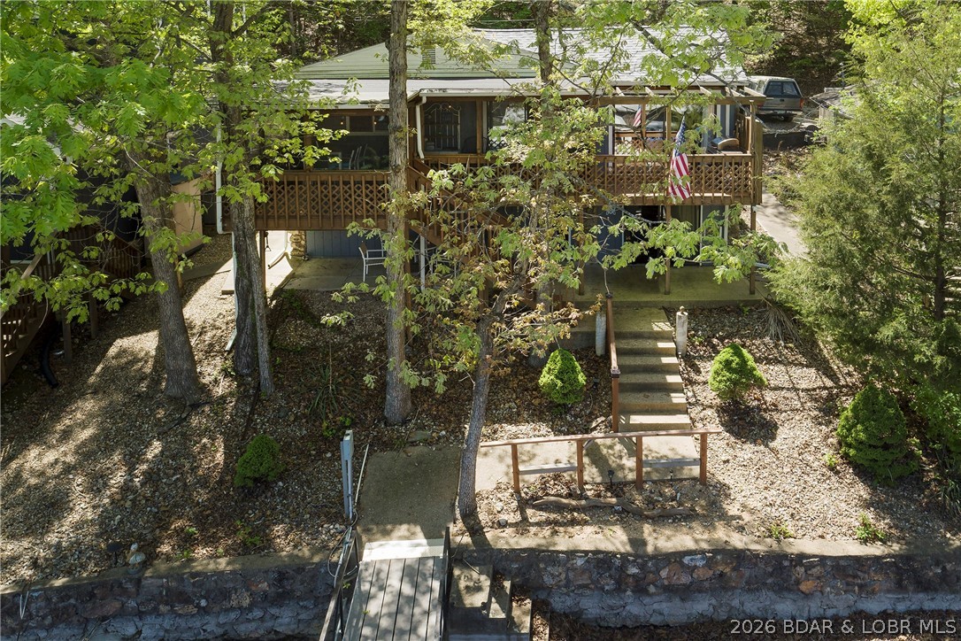 Newer HVAC, roof and gutters, water heater, and appliances. Currently used as a vacation rental. Living on entry level (including washer and dryer). Screened deck is perfect for morning coffee or evening entertaining. Deep water cove, dock has cruiser slip and large storage shed for your toys. Close to Paradise restaurant by land or water, 5 minutes to the grocery store.