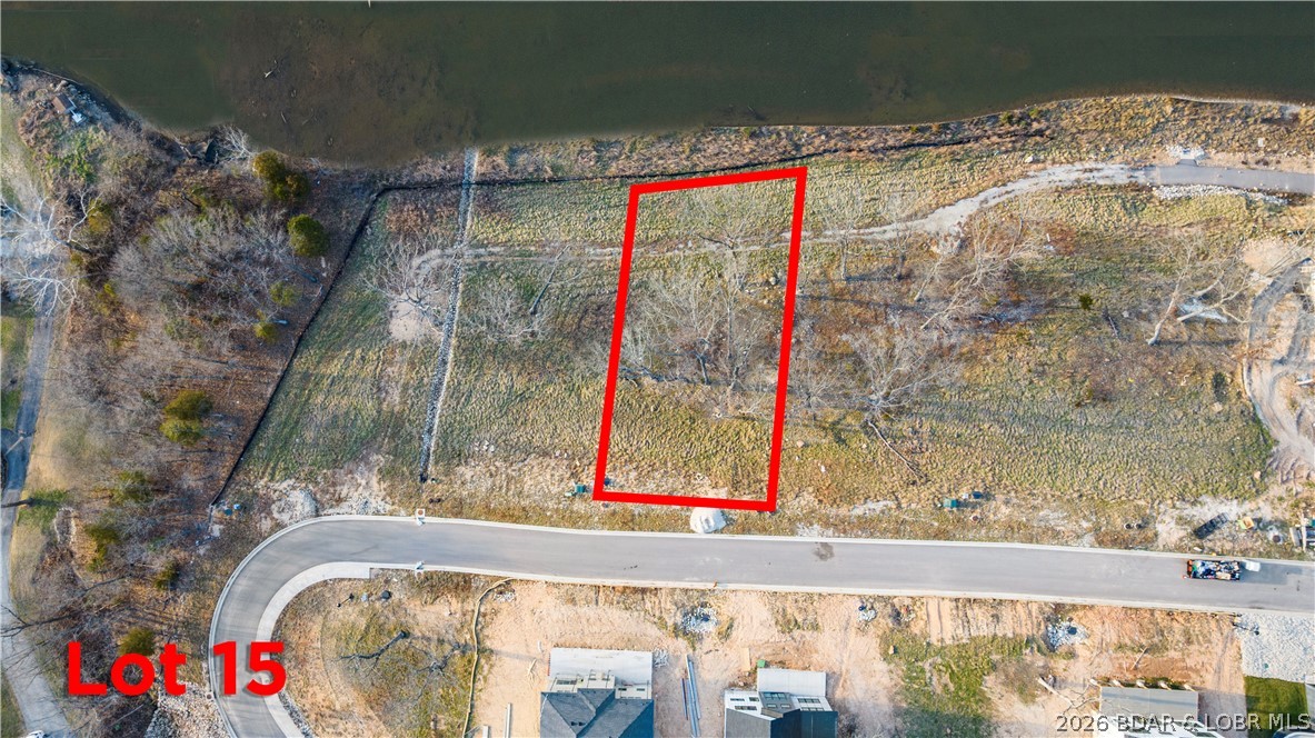 Welcome to Harpers Cov- Osage Beach's newest Lakefront, Lakeview/Lake access Subdivision located off the 18 mm of the Osage Arm. Ideal location by both land & water-only minutes by the best amenities the Lake of the Ozarks has to offer. This subdivision has great momentum- new construction homes, villas and new homeowners already enjoying Harpers Cov. Enjoy the Subdivision Lakeside pool with clubhouse, paved streets w/curbs & sidewalks, fiber optic internet, natural gas, city water & sewer, community trash & street lights. Don't miss the community park area by the Elephant rocks- a true site all by itself! Golf cart friendly with paths in place down to the community pool and docks in place (more coming soon). Build your own custom home today! Builders welcome. Numerous boat size slips available. This is what everyone has been waiting for, a centrally located place to enjoy the Lake life. Each buyer is asked to contribute $1500 towards the reserve fund at closing.
