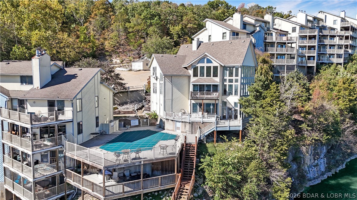 We invite you to take a look at this new listing here in Oak Bluff Condominium. Located on the Big Niangua arm of Lake of the Ozarks: this 3 bedroom, 2 bath condo is one you don't want to miss! As you step inside the entry features an open floor plan walking out to the Lakeside deck area. An expansive master ensuite is located just off the living room area. Heading to the road side are two ample sized guest bedrooms with spacious full bathroom. This condo unit is light, white, bright and ready for you to come in, add your favorite color to make it your new Lake Hot Spot for Summer 2026!! This purchase includes a 12x32' boat slip, PWC slip, covered carport parking in the front of the building. Community amenities include: outdoor pool, clubhouse with whirlpool, exercise room, sauna and billiard room. Located nearby: Ha Ha Tonka State Park, popular lakefront restaurants such as The Cave & NautiFish. Call us today to schedule your private tour of this stunning condo here at Lake of the Ozarks.