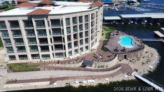Developer units for sale at The Hamptons in Osage Beach. Top floor unit where the views do not get any better! Step into a world where luxury meets serenity. This gated community is just a short walk to The Oasis, Dog Days and several other lake attractions. With only a limited number of 4/5 bedroom units available, experience grand living in the heart of Osage Beach. These new construction condos have the same great Hamptons on the Lake amenities & location but this is a different builder/developer than the previous buildings. New amenities were also added, a hot tub by the pool, fitness center, a clubhouse, lakeside shuffleboard court, fire pits and a wonderful swim dock! Between the buildings is also a resort-style breezeway. Relax, connect, and unwind in this lounge-setting area against a backdrop of the lake and pool. It is rare to find 4 bedroom condo units at the lake. When you add that this complex doesn't allow nightly rentals, offers nearly 3,000 sq ft, and 4 baths all in this location, Forget about it, this is the one. Finishes are all top notch so stop in today to learn more about these new construction condos. Boat slips are available to purchase up to 18X48.