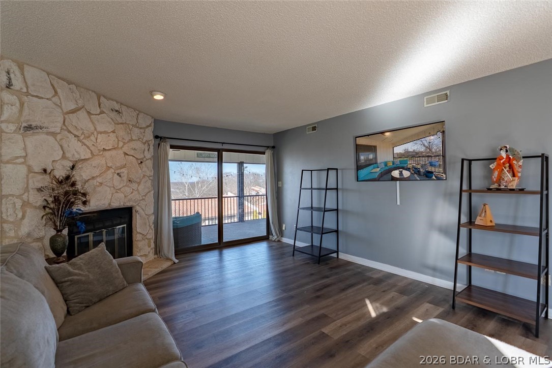 Updated 2 bedroom, 2 bath condo in the heart of Lake Ozark offering 1,527 sq ft. Access to the highly sought-after Four Seasons amenities. Whether you're looking for a weekend lake retreat, full-time residence, or investment property, this unit checks the boxes. Inside you’ll find luxury vinyl plank flooring, fresh paint, updated kitchen cabinets with pantry and breakfast nook, plus a spacious living area that opens to a screened deck. The primary suite features an updated walk-in shower and modern fixtures. Guest bedroom and hall bath provide comfortable space for family or renters. Short-term rentals are allowed, making this an attractive option for investors. Owners enjoy access to Four Seasons boat ramps, multiple community pools, playgrounds, dog park, campground, and three fishing lakes. Conveniently located near restaurants, golf, entertainment, and lake access.